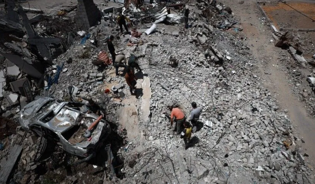 İsrail'in Gazze'ye yönelik saldırılarında yıkılan 20 evin enkazından 233 Filistinlinin naaşı çıkarıldı